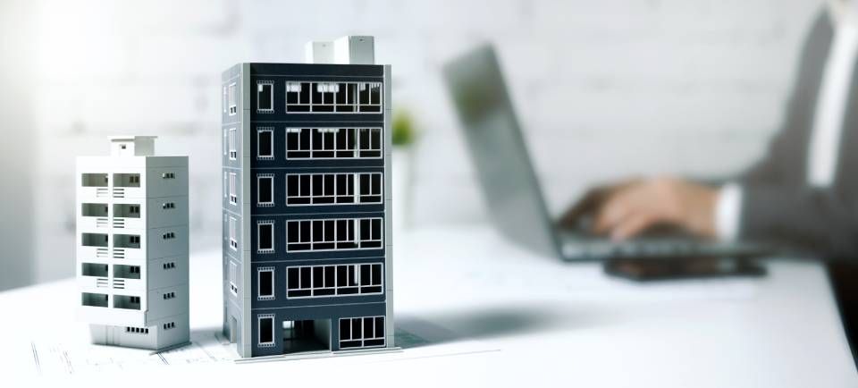 office with building models on table