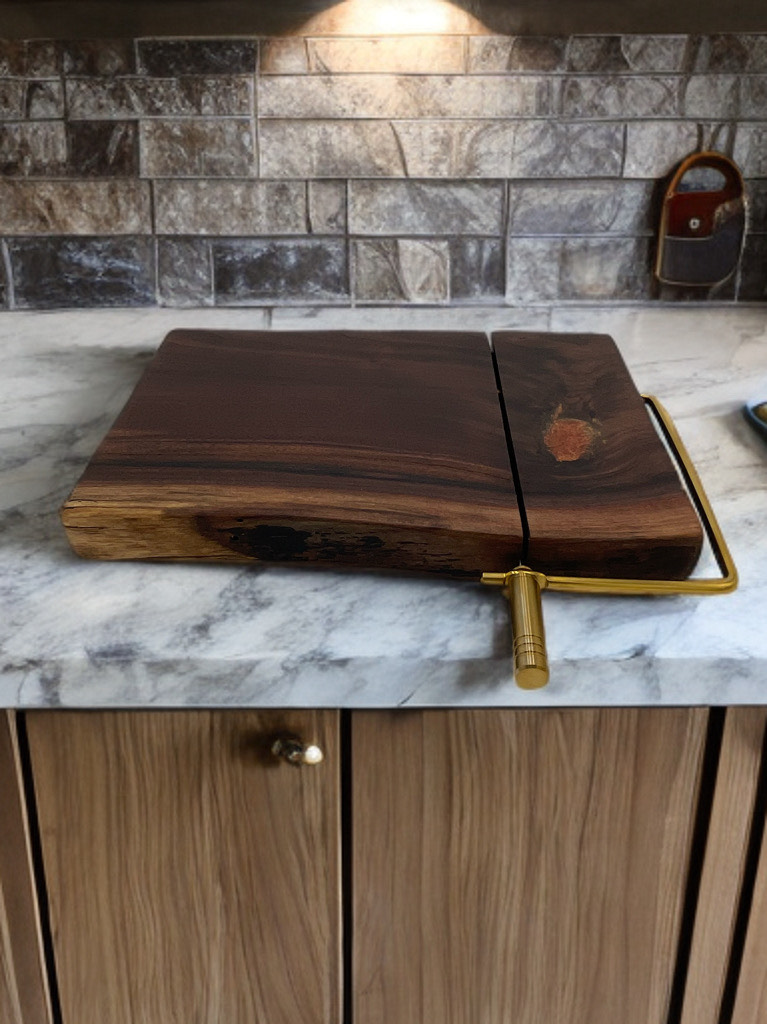 A wooden cutting board is sitting on top of a marble counter.