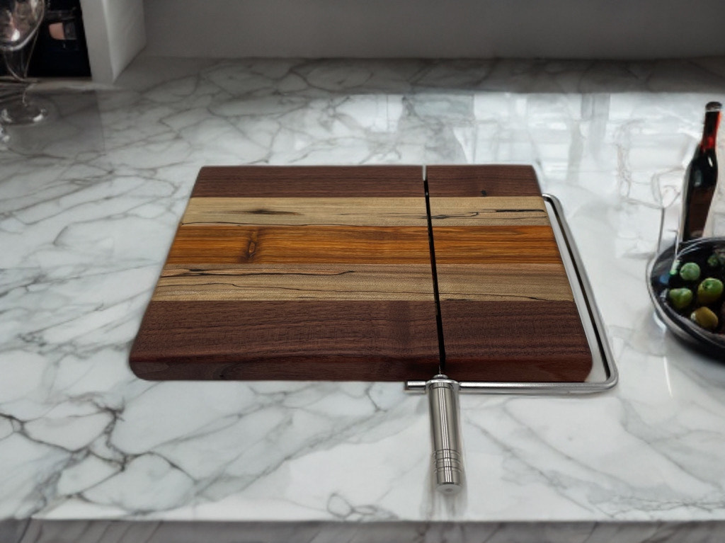 A wooden cutting board is sitting on top of a marble counter.