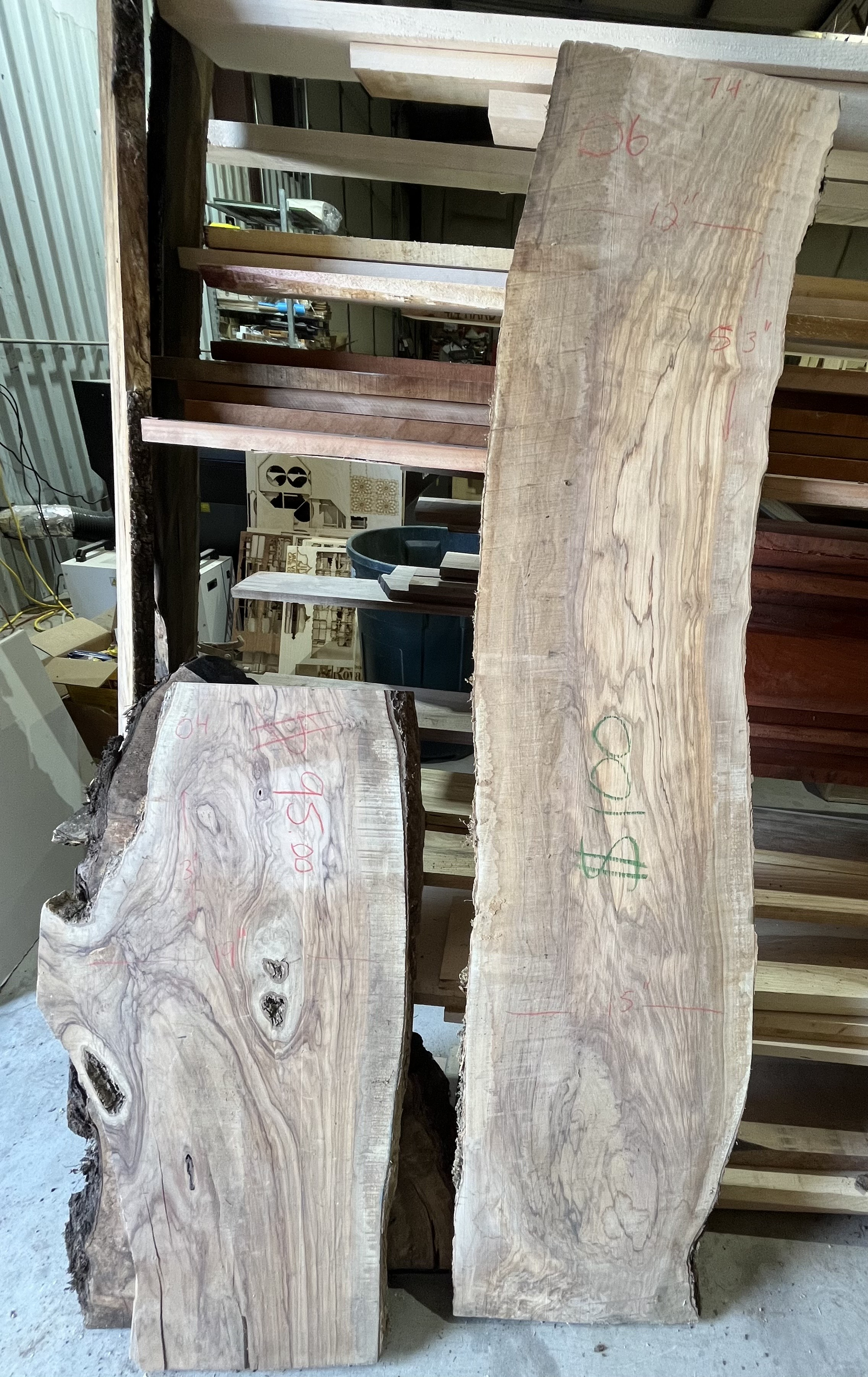 Two pieces of wood are sitting next to each other in a room.