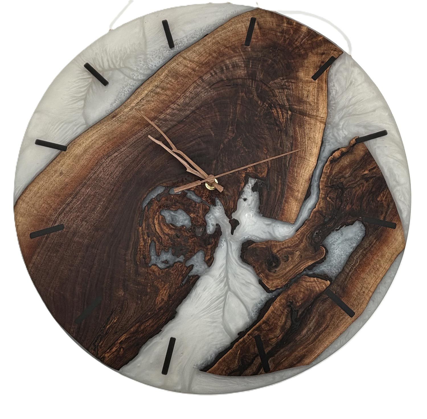 Wooden wall clock with dark wood and white epoxy resin, black hour markers, and gold hands