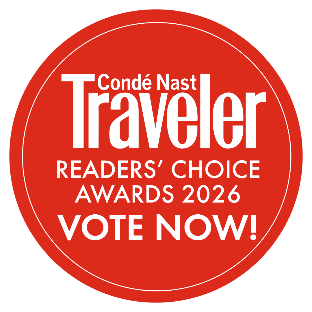 Red circular Condé Nast Traveler Readers’ Choice Awards 2026 badge with “Vote Now!”