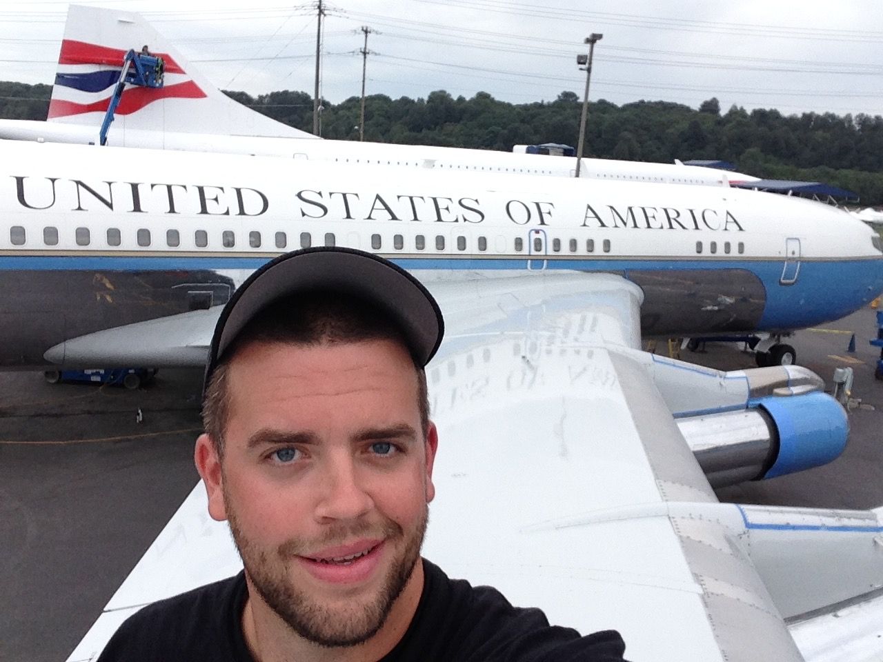 Carson standing on the wing of SAM 970