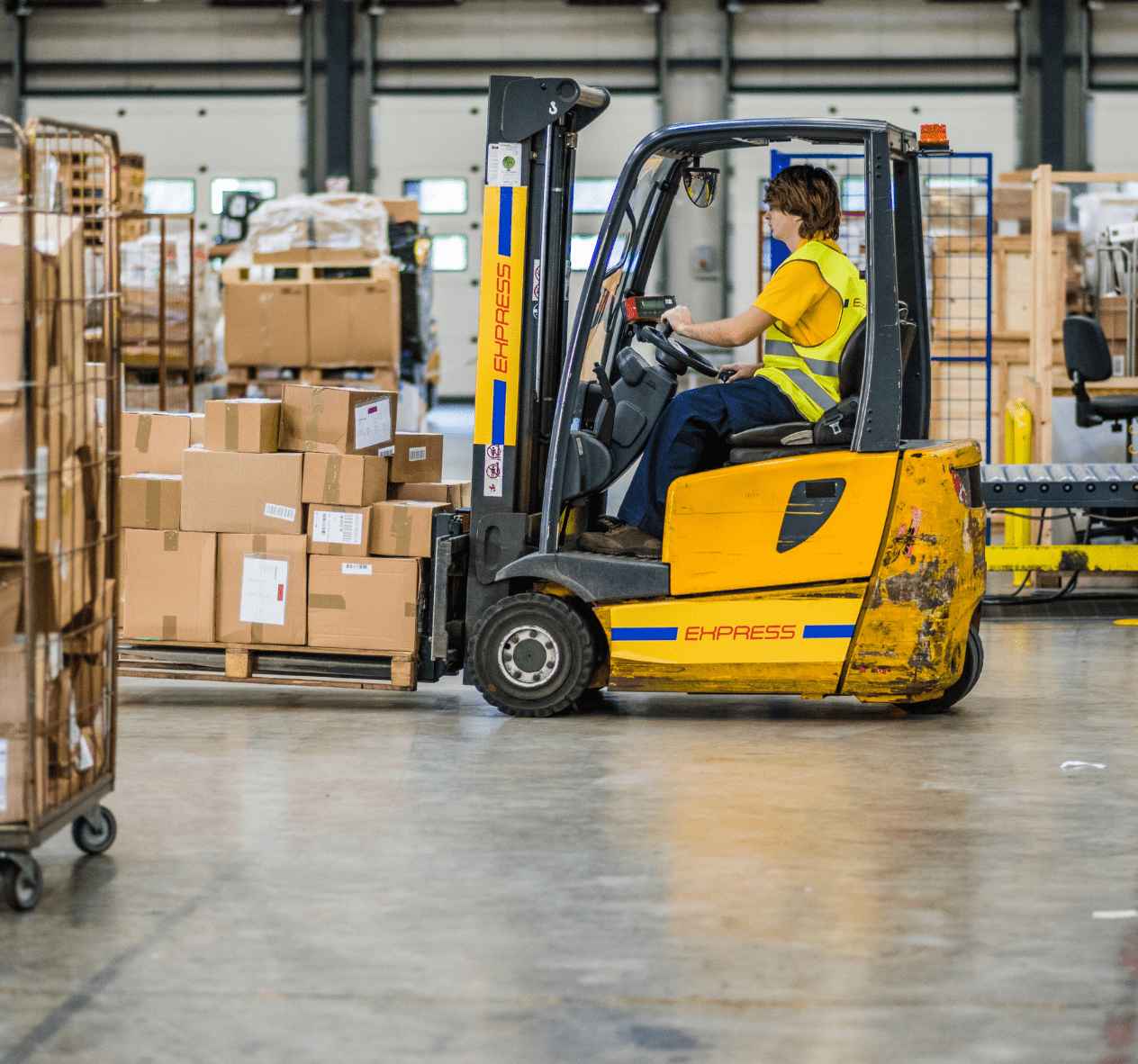 the employee working with the forklift