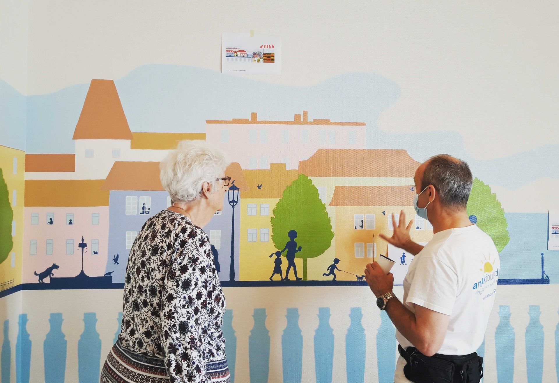 Assisted living staff and resident