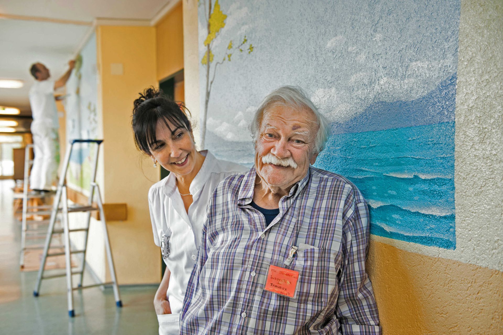 Alzheimer mural with residents and staff