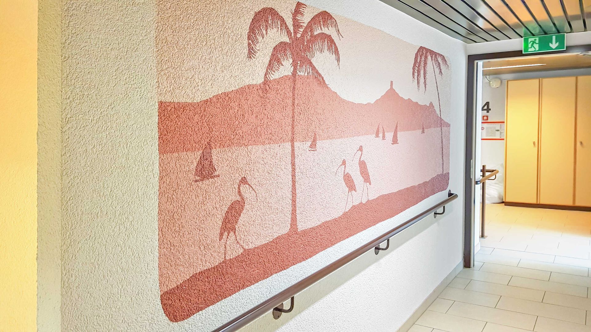Daycare hallway mural done red painting