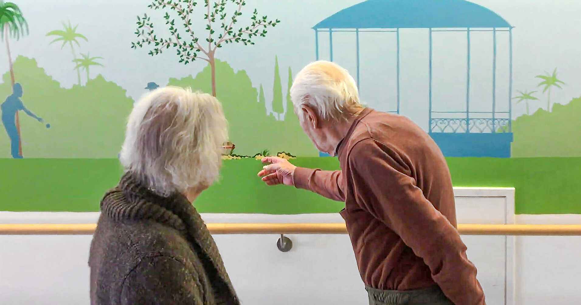 Alzheimer mural with resident couple