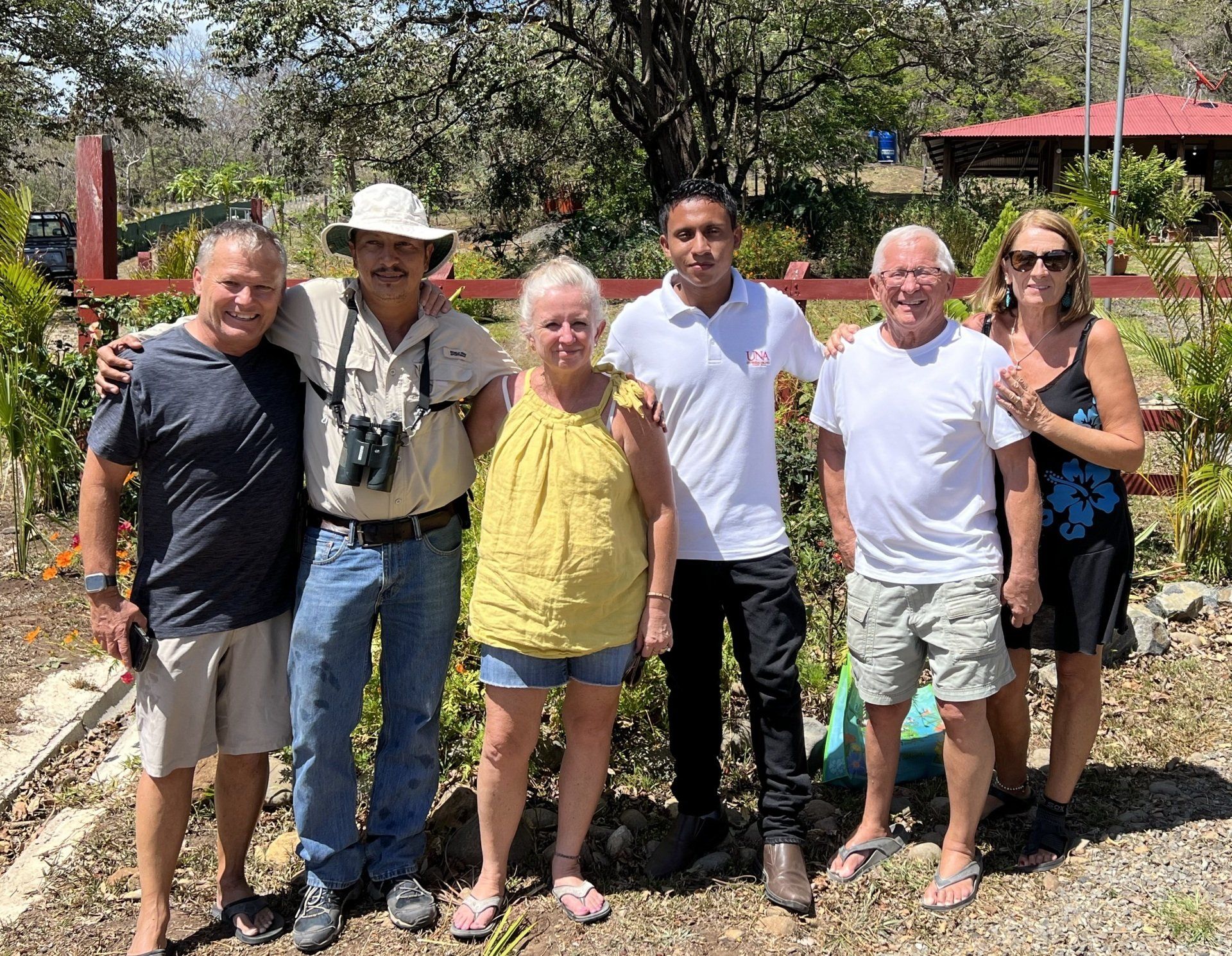 A group of people are posing for a picture together.