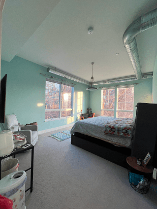 There is a large bed in the middle of the room.