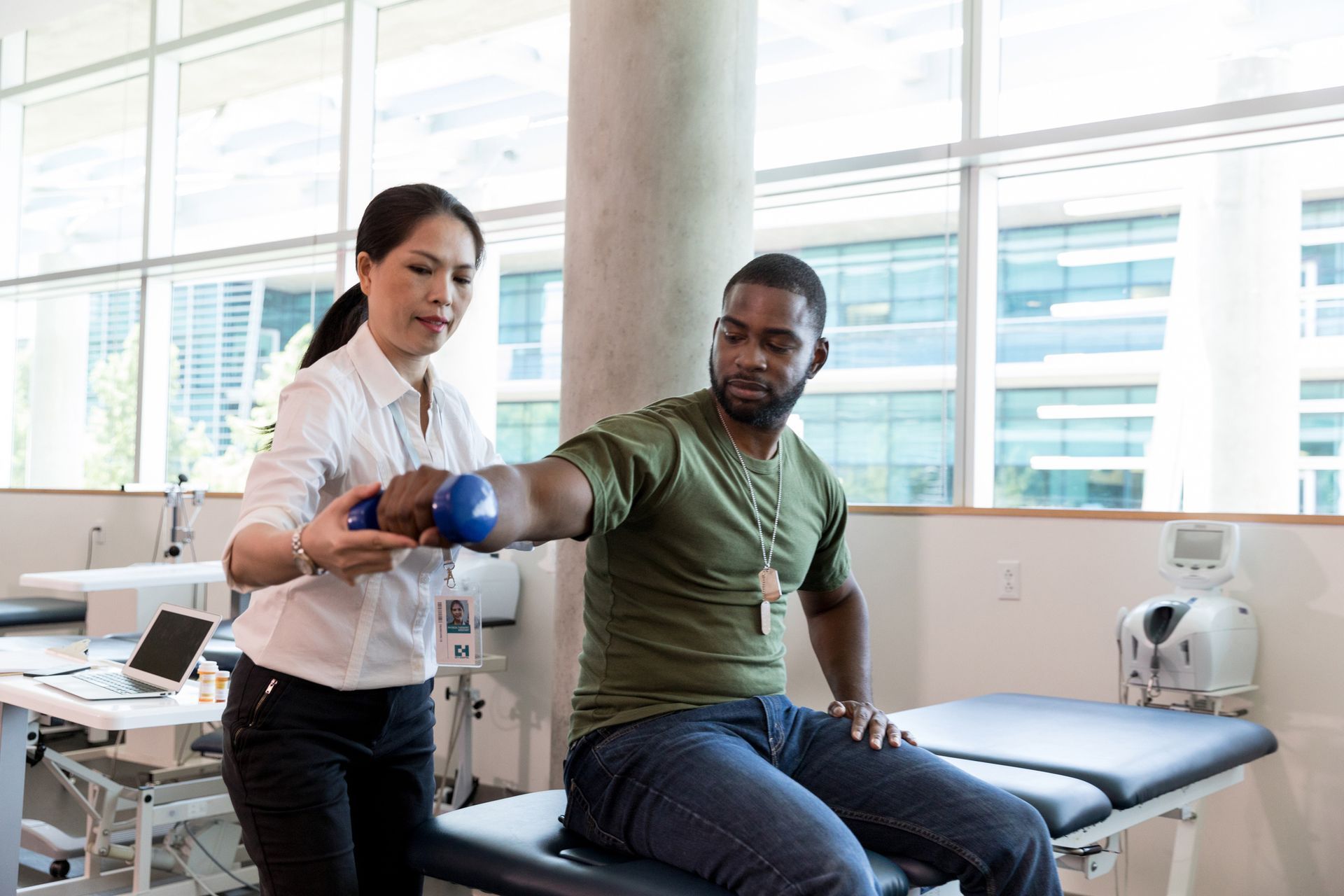 Injured soldier in physical therapy.