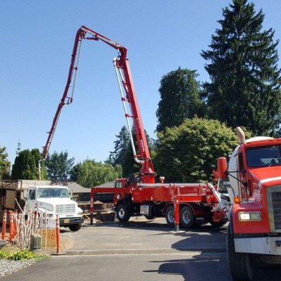 Concrete Truck Pouring Cement — Ready-mix concrete service in Wood Village, OR