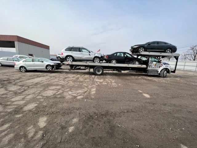 Truck Pulling Cars — Fort Wayne, IN — Blue Eagle Towing