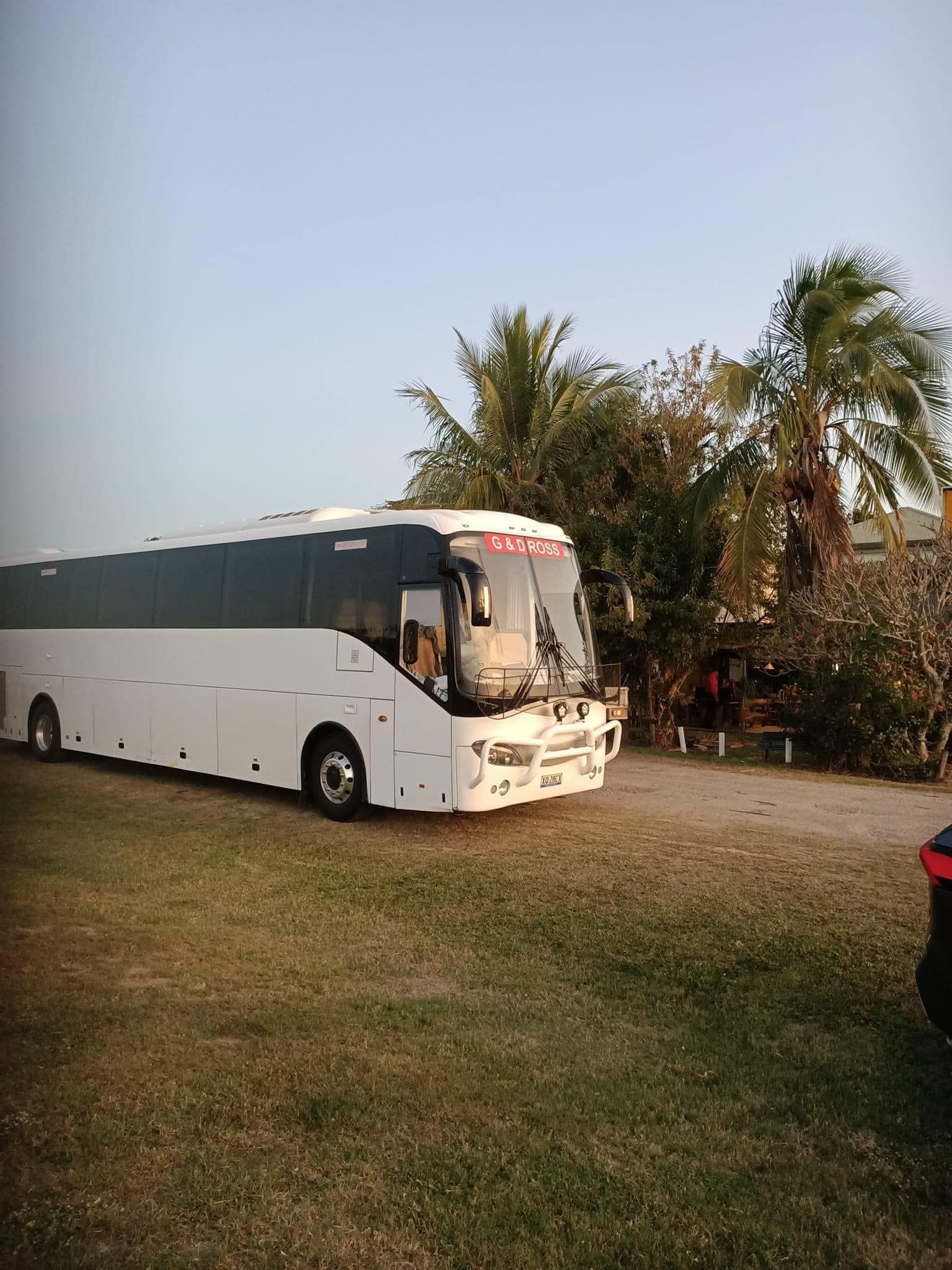 Bus on Dirt Road — G & D Ross Bus Charters In Magnolia, QLD
