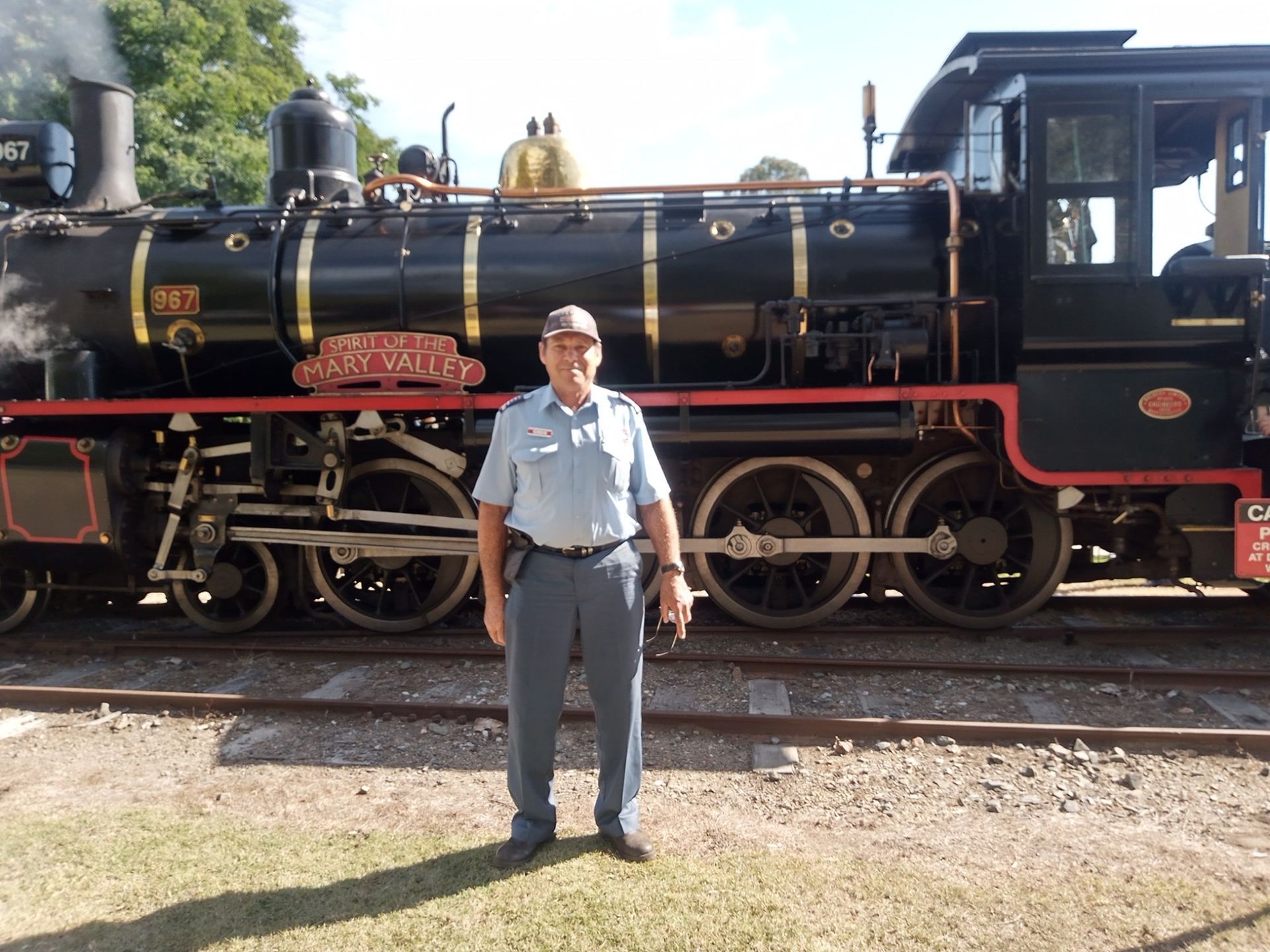 Greg In Front Of the Mary Valley Rattler — G & D Ross Bus Charters In Magnolia, QLD