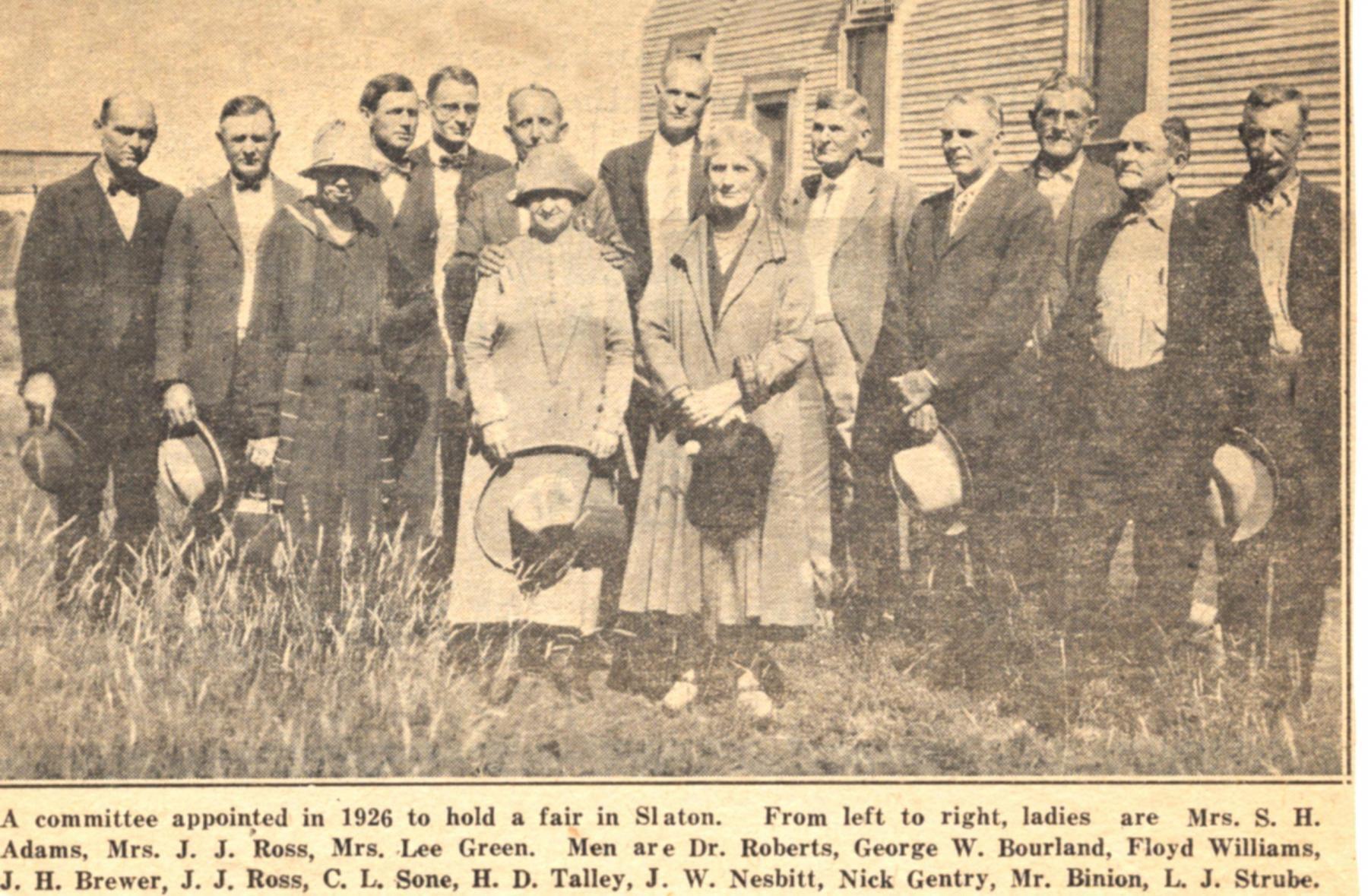 A black and white photo of a group of people