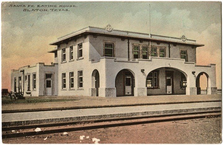 A black and white photo of a train station in santa fe texas
