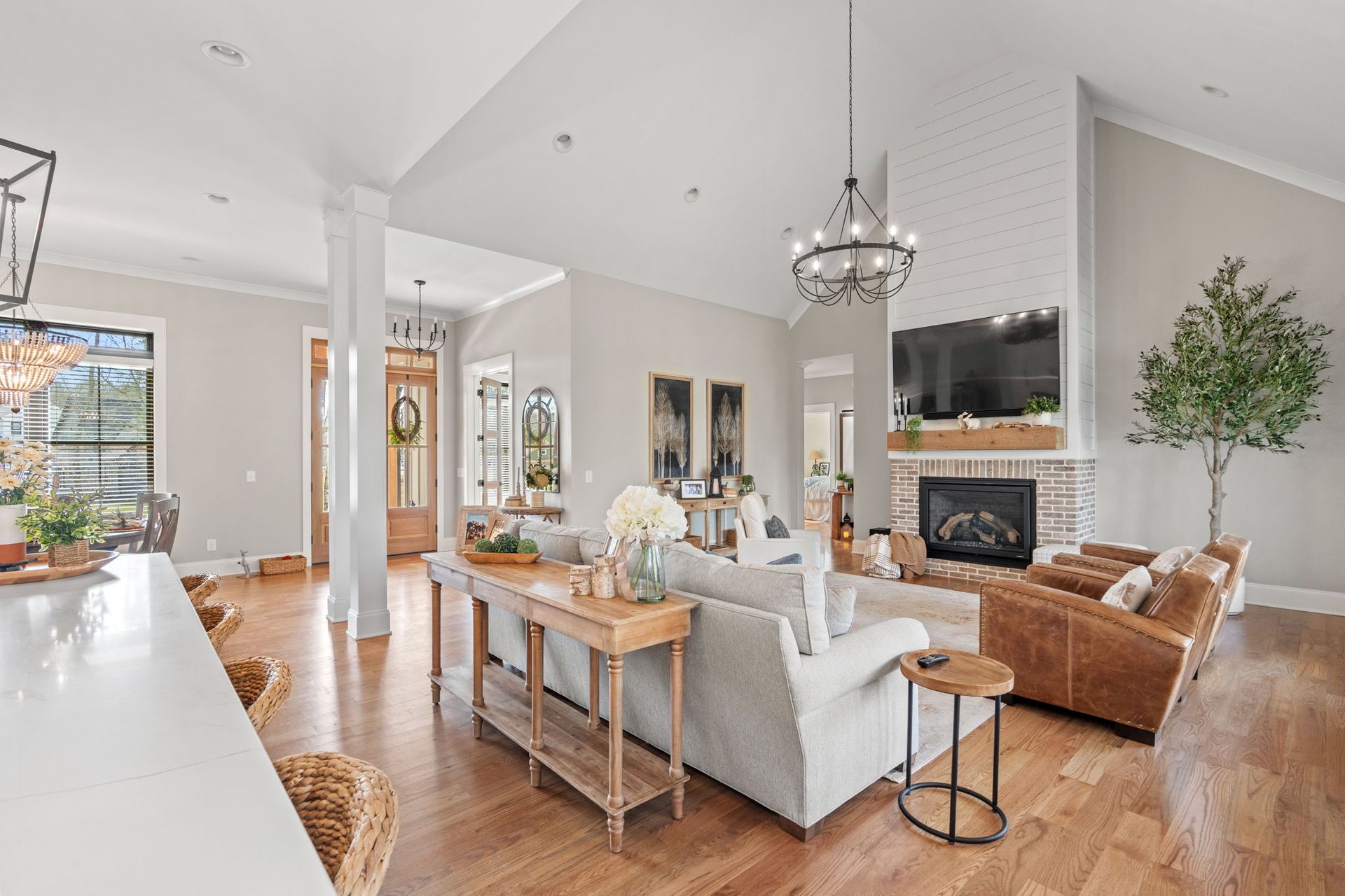 A living room filled with furniture and a fireplace.