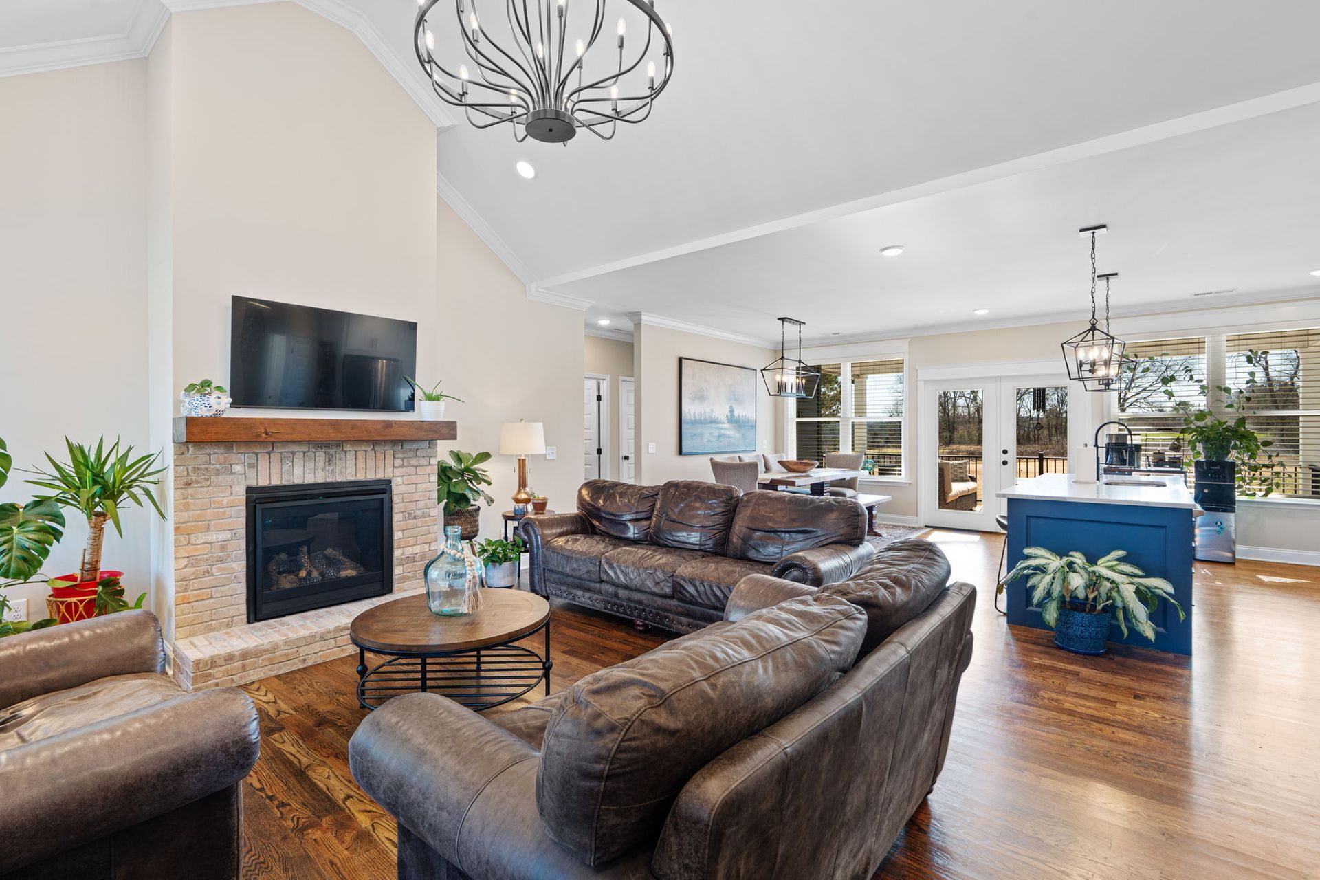 A living room filled with furniture and a fireplace.