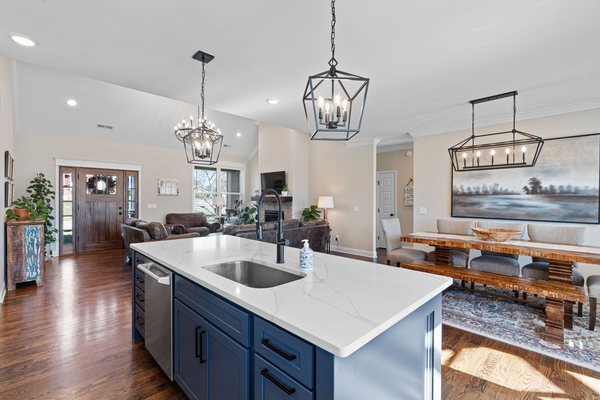 A kitchen with a large island in the middle of the room.