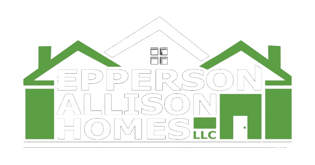 A green and white logo for a real estate company.