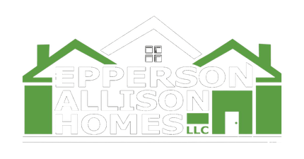 A green and white logo for a real estate company.