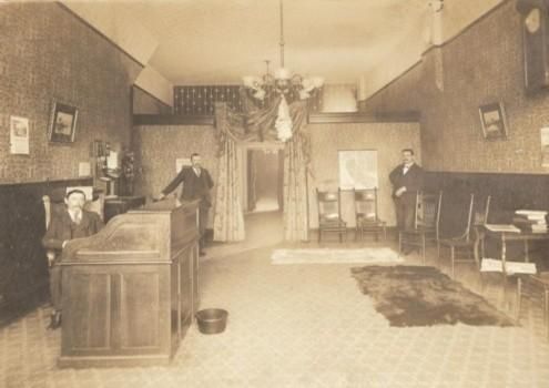 Old sepia photo of original W.F Gormley & Sons Funeral Chapel in Sacramento, CA.