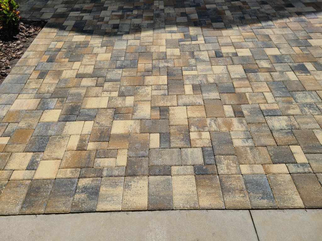 Washing yellowish pavement — Apollo Beach, FL — EGA Parking Lot Striping & Pressure Washing