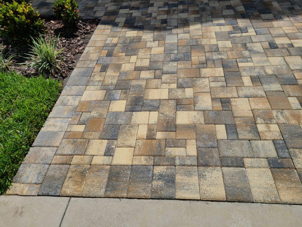 Yellowish pavement after pressure washing — Apollo Beach, FL — EGA Parking Lot Striping & Pressure Washing