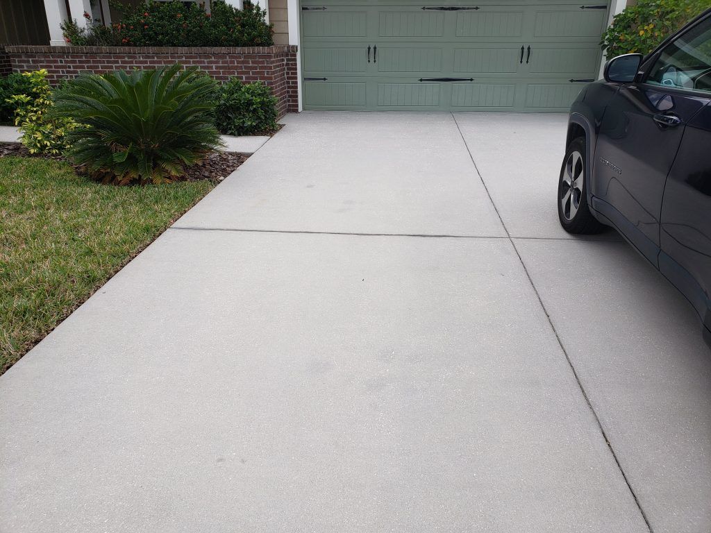 Nice and clean driveway — Apollo Beach, FL — EGA Parking Lot Striping & Pressure Washing