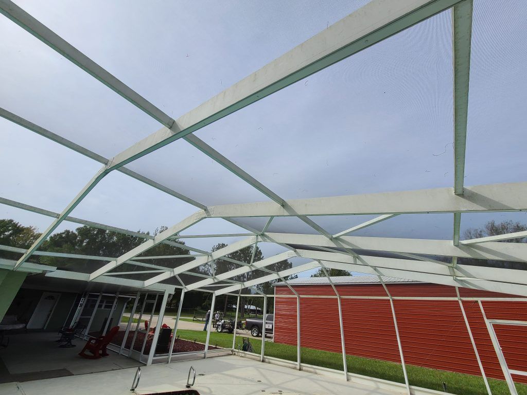 Different shot of pool enclosure washing — Apollo Beach, FL — EGA Parking Lot Striping & Pressure Washing