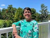 Carmen M. Guzman, Executive Director