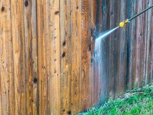 Pressure Washing — Wooden Wall Being Cleaned In Mount Holly, NC