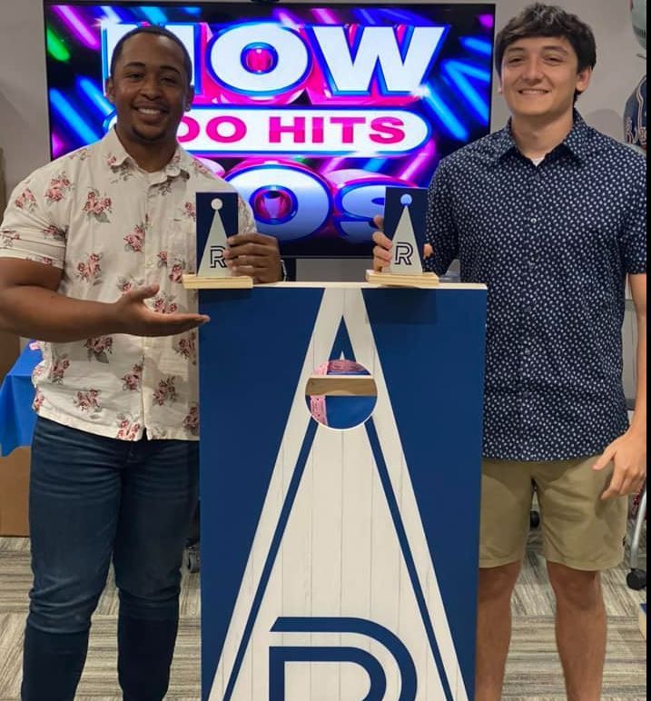 People holding an Award 