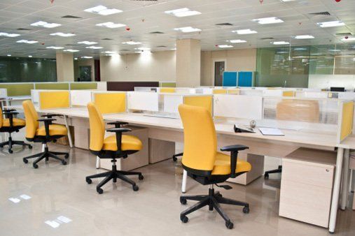 Office Tables Furniture — Office with Yellow Chair in Eatontown, NJ