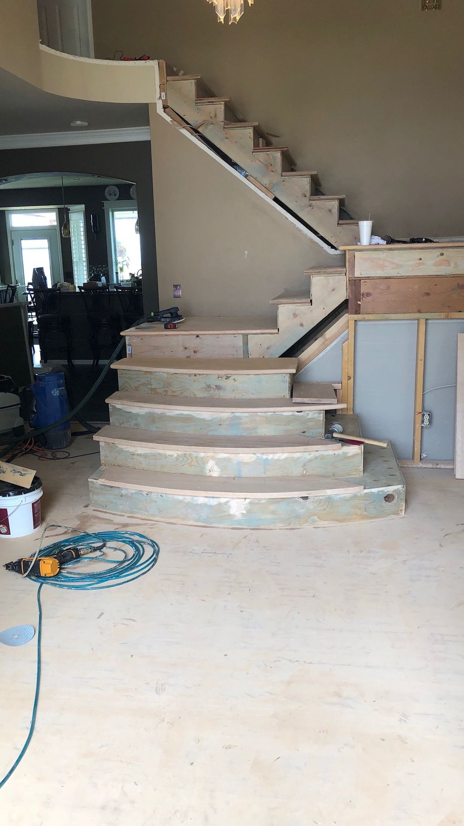 A staircase is being built in a house.