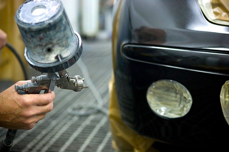 Painting Car with Spray Paint — Longview, TX — Royce's Paint & Body Shop Inc.