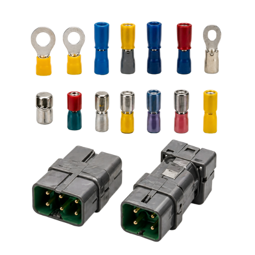 Assorted crimp wire terminals and two gray electrical connector housings on white background