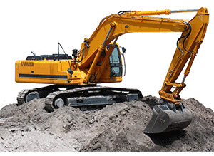 A yellow excavator is digging in a pile of dirt