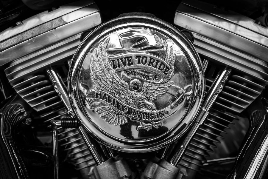a black and white photo of a harley davidson motorcycle engine .