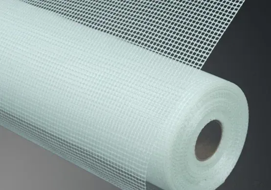 A roll of white mesh is sitting on a table.