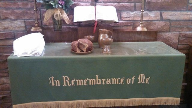 Altar with bread, chalice, and pitcher, 