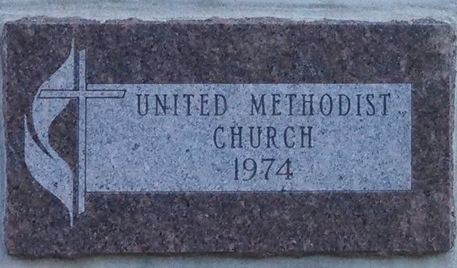 Sign with United Methodist Church logo and 