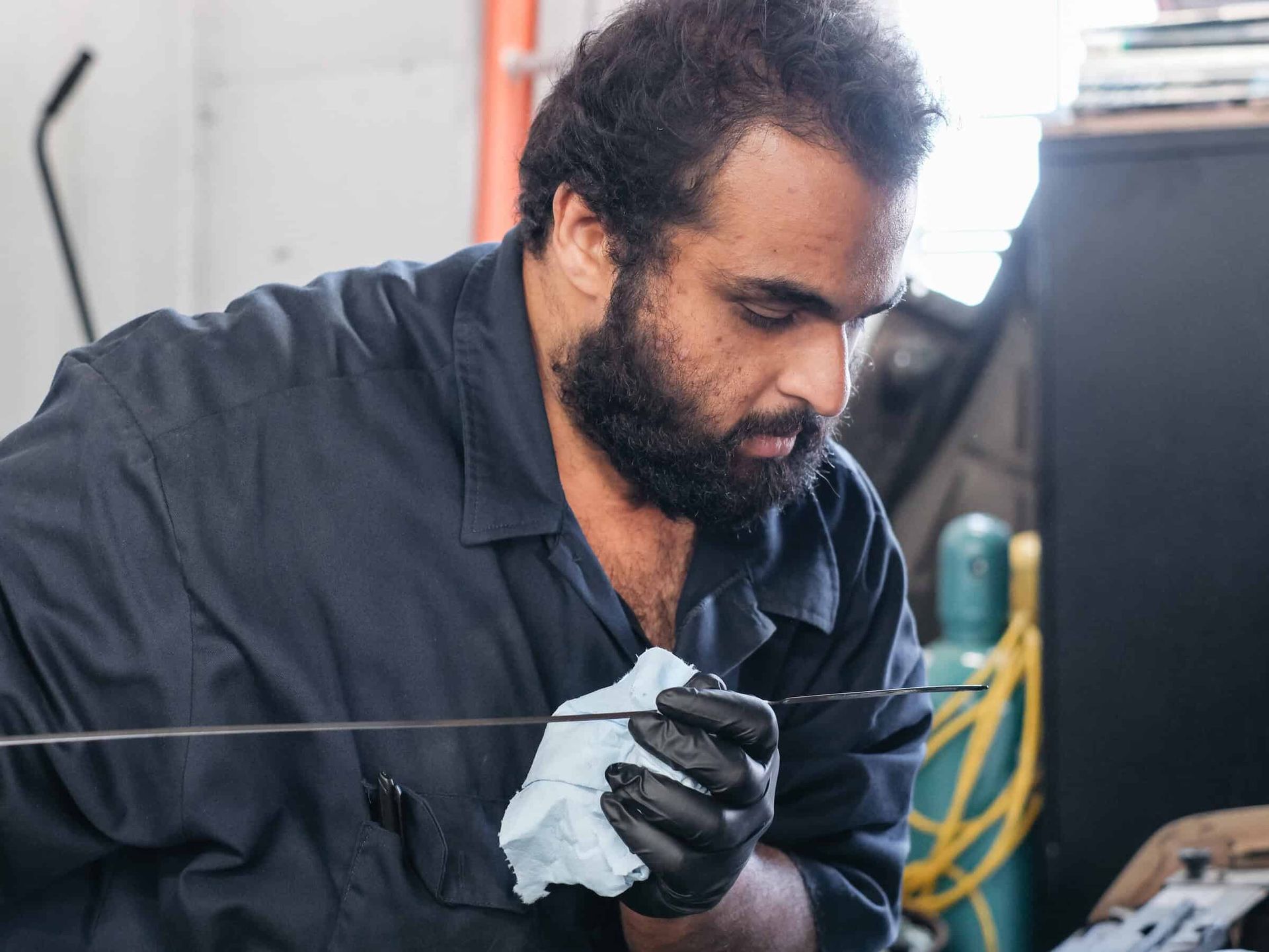 Inspecting engine oil condition as part of a full vehicle fluid check