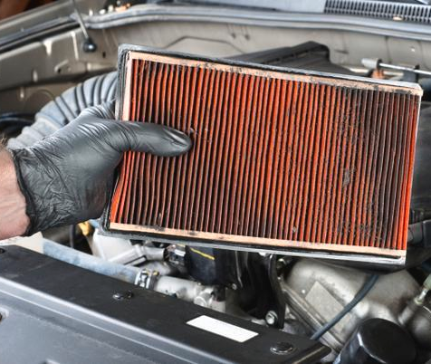 Engine air filter inspection and replacement at San Juan Auto Smog