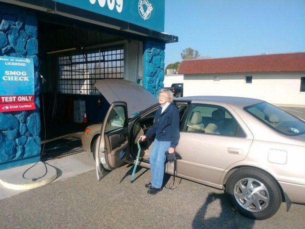 A sign that says $ 21 off all vehicles free re-test no appointment necessary