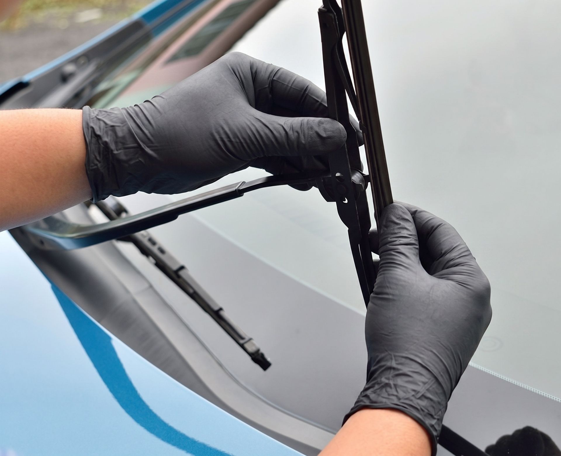 Installing new windshield wiper blades for clear visibility and safer driving