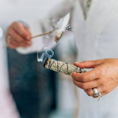 Holding A Stick Of Sage — Tampa, FL — Psychic Maya