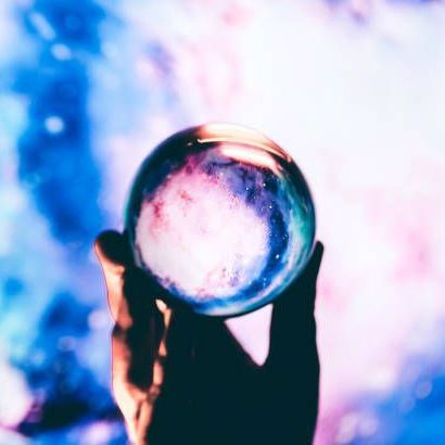 Hand Holding A Crystal Ball — Tampa, FL — Psychic Maya