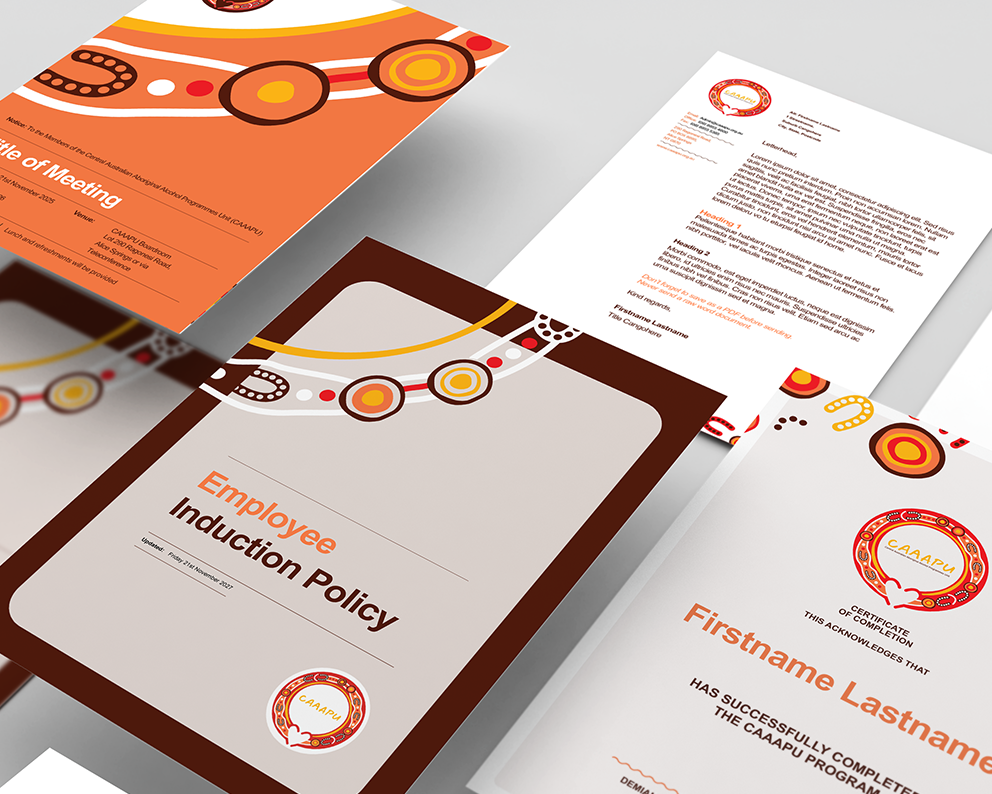 Various company documents with Aboriginal art designs: cover, letter, and policy.